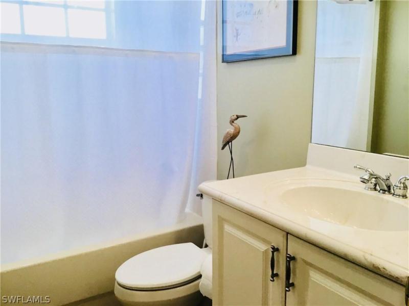 1619 Triangle Palm TER Naples, FL 34119 photo 11