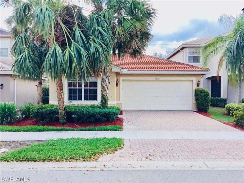 1619 Triangle Palm TER Naples, FL 34119 photo 6