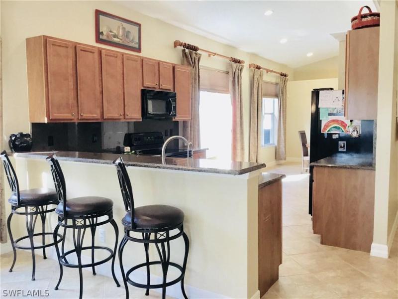 1619 Triangle Palm TER Naples, FL 34119 photo 9